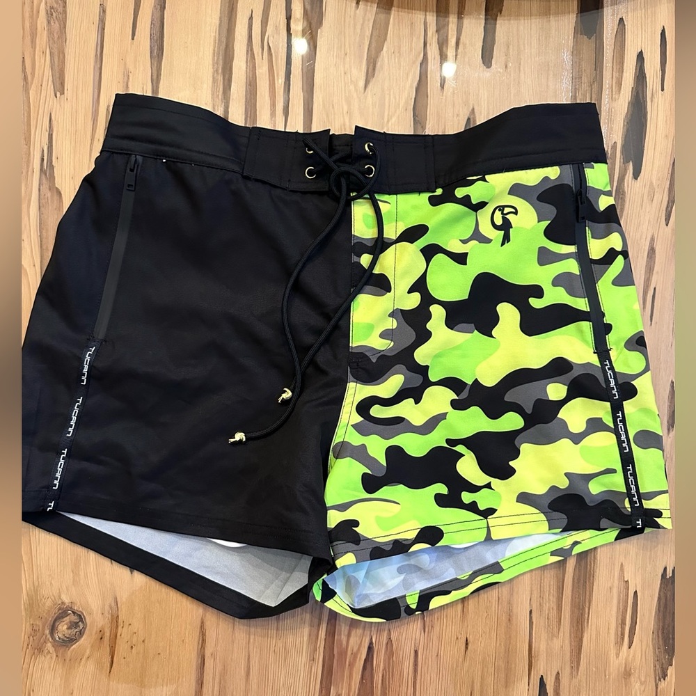 Tucann swim shorts 3 inch inseam split black and green camo.